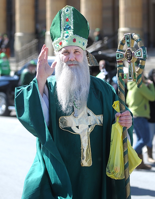 Stephen Caruana, represents St. Patrick during City of Buffalo Annual St. Patrick's Day Parade on Delaware Avenue. Caruana, who is a parishioner at Nativity Church in Clarence, has marched in the parade for 17 years. (Dan Cappellazzo/Staff Photographer)